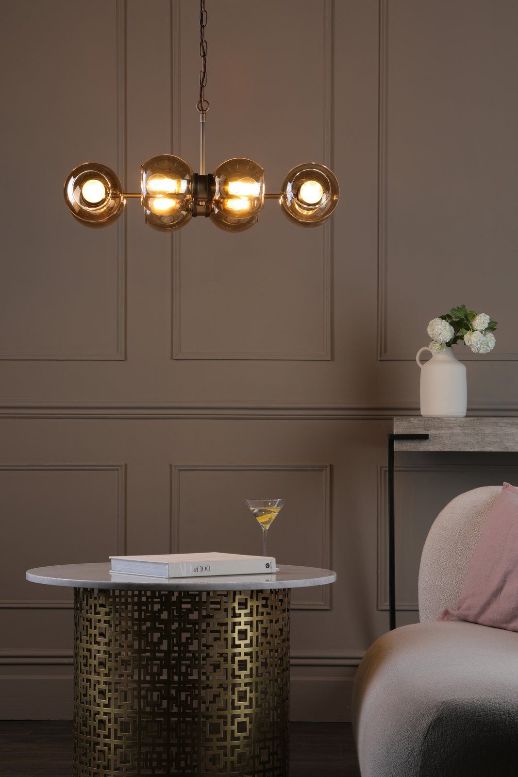 Juno 8/16 Light Pendant Antique Brass and Amber Glass