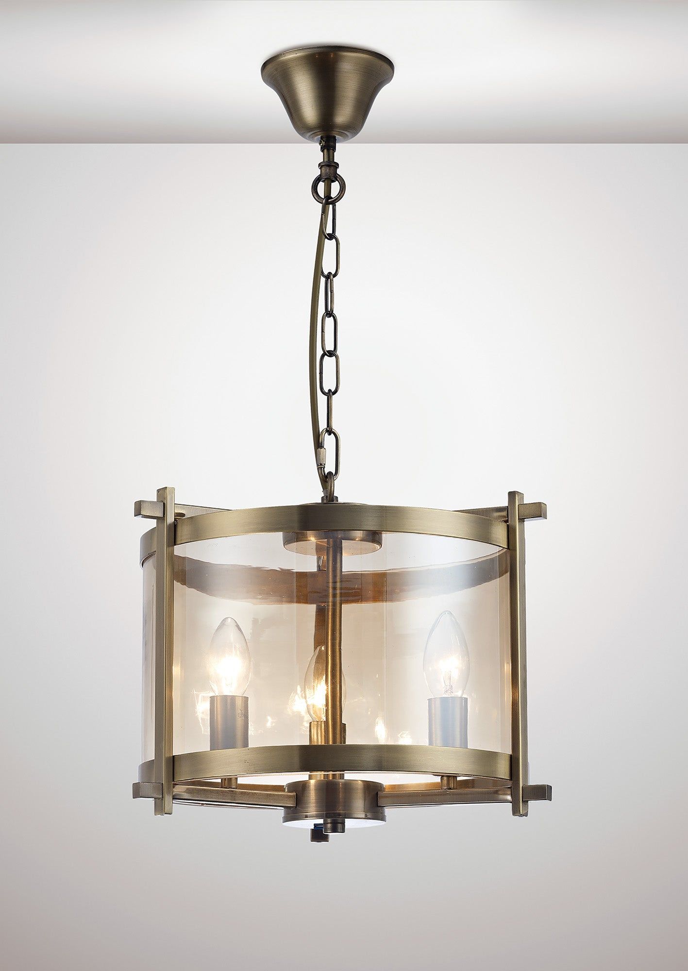 Nolan Single Small Pendant 3 Light E14 Antique Brass/Amber Glass